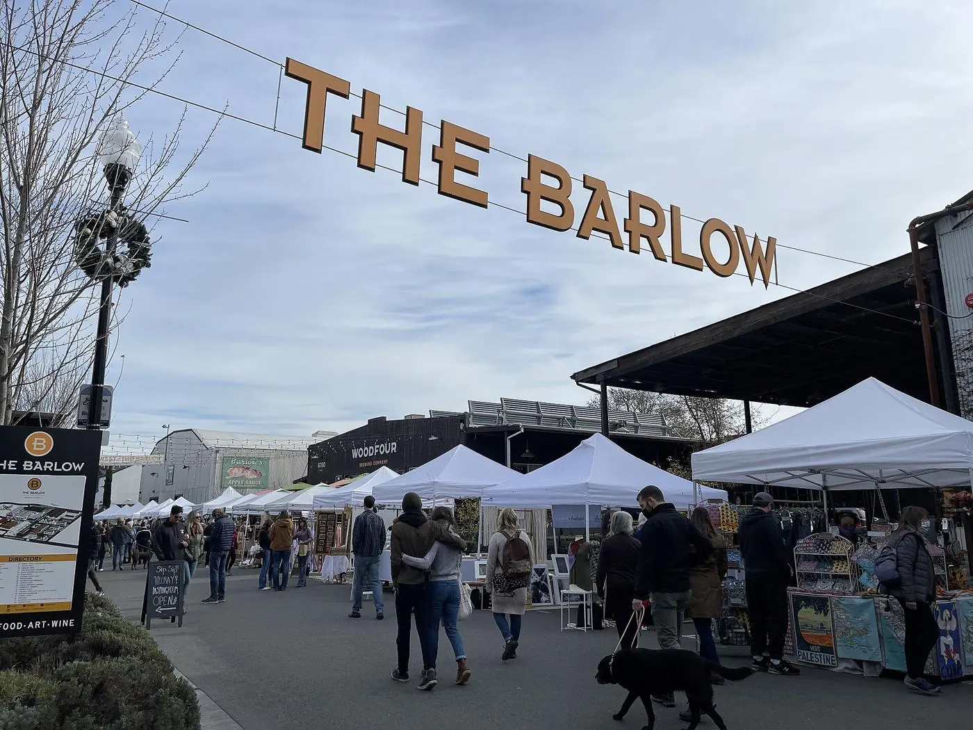 Market stalls under The Barlow sign in Sebastopol